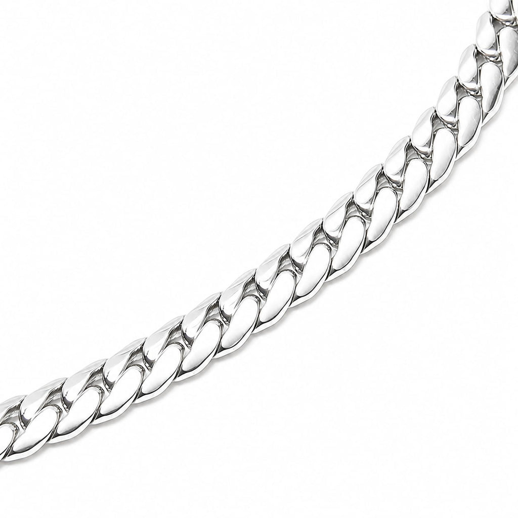 Close-up of polished stainless steel curb chain necklace